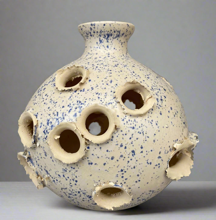 Ceramic Vase with bullet holes