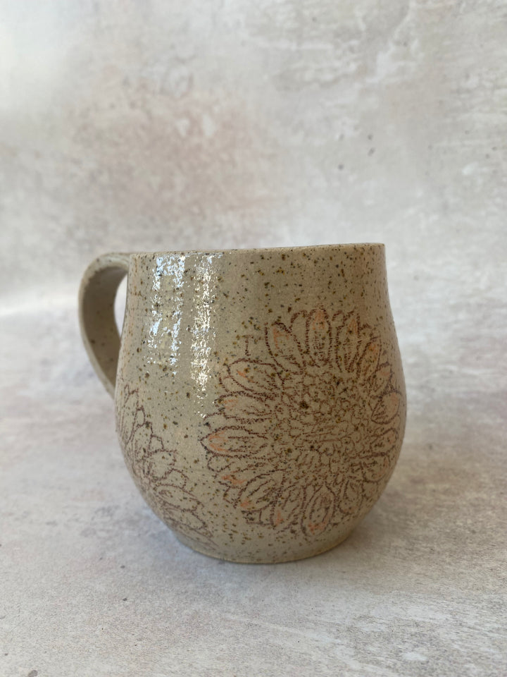 Handmade speckled clay sunflower ceramic mug with hourglass shape hand thrown in Shropshire UK