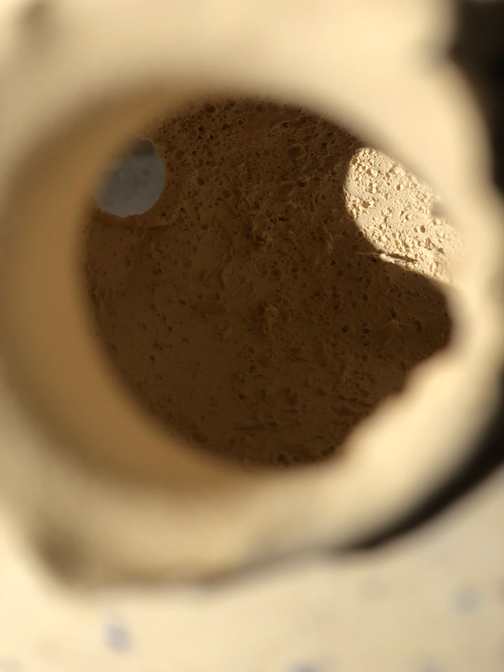 Ceramic Vase with bullet holes