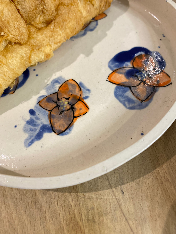 Set of 4 hand orange/blue flower hand painted plates