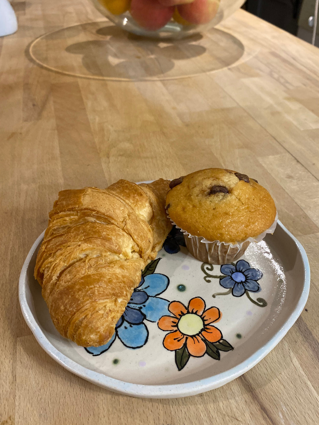 Hand decorated plate with food on